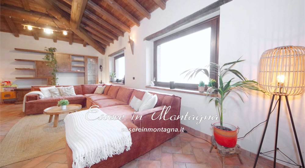 Il soggiorno open sulla cucina