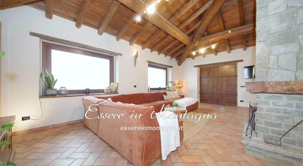 Il soggiorno open sulla cucina